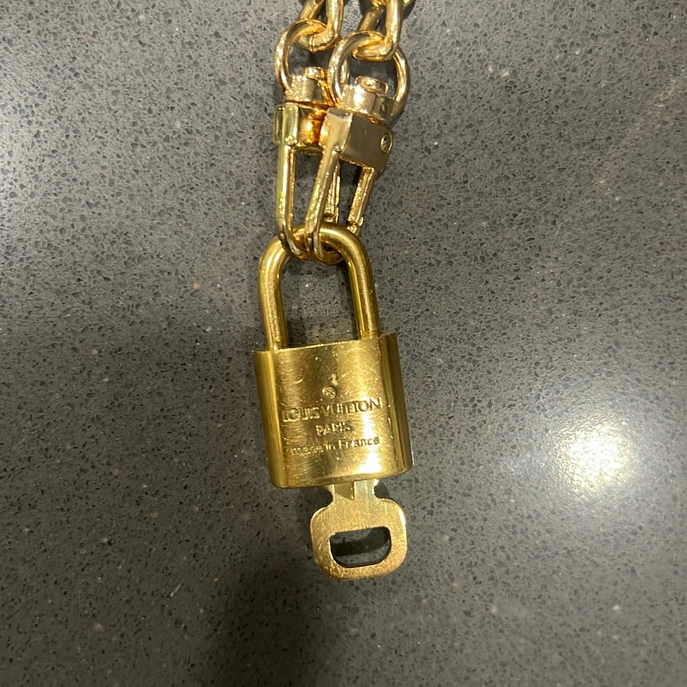 Louis Vuitton lock and key w/ chain